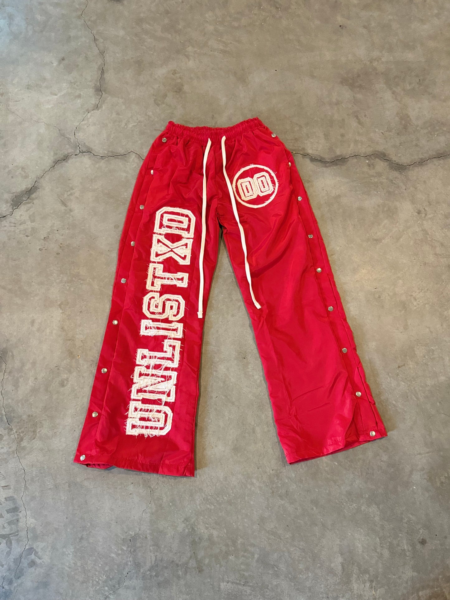 Red Double 0 Trackpants