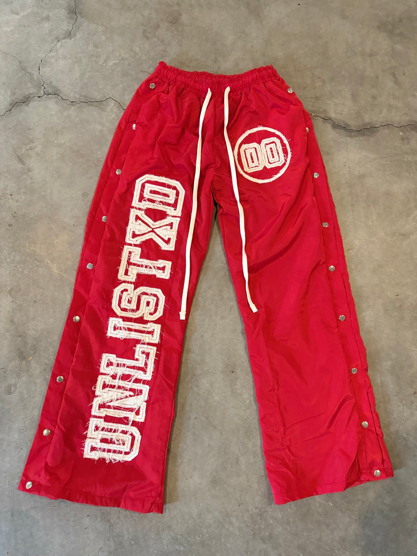 Red Double 0 Trackpants