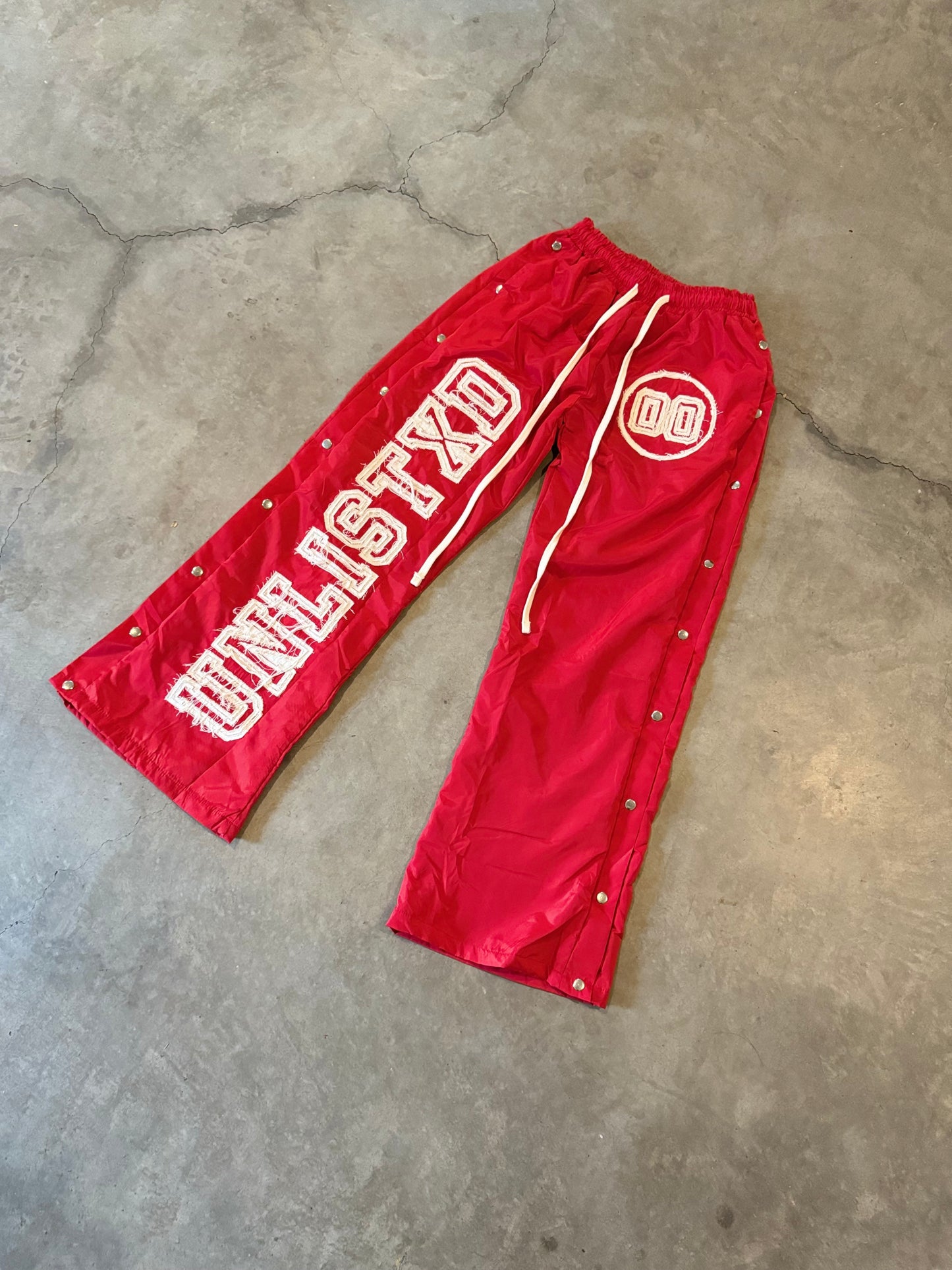 Red Double 0 Trackpants